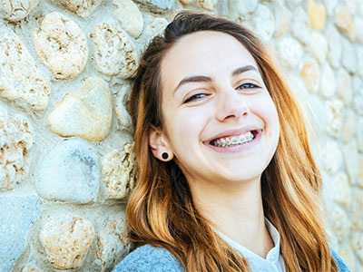 girl with braces smiling